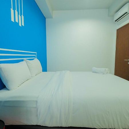 Minimalist 2Br Apartment At Springhill Terrace Residence By Travelio جاكرتا المظهر الخارجي الصورة